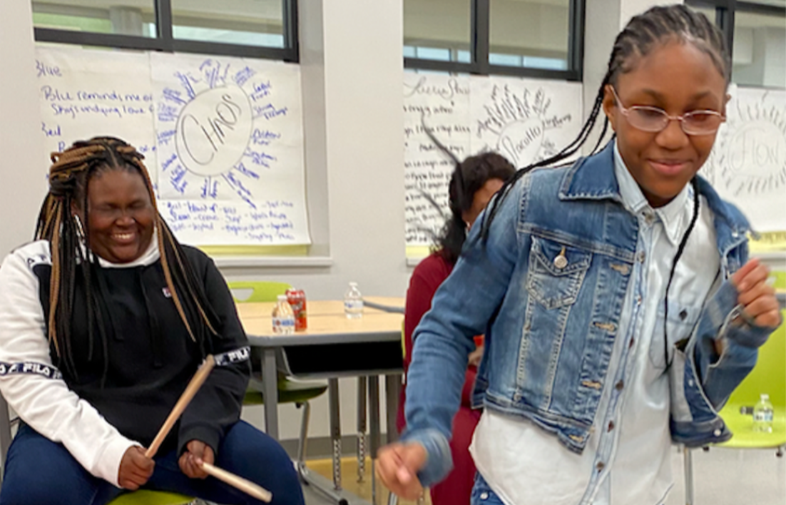 Greenmount West Community Center students during an improvisational scene with the Lyric Education team