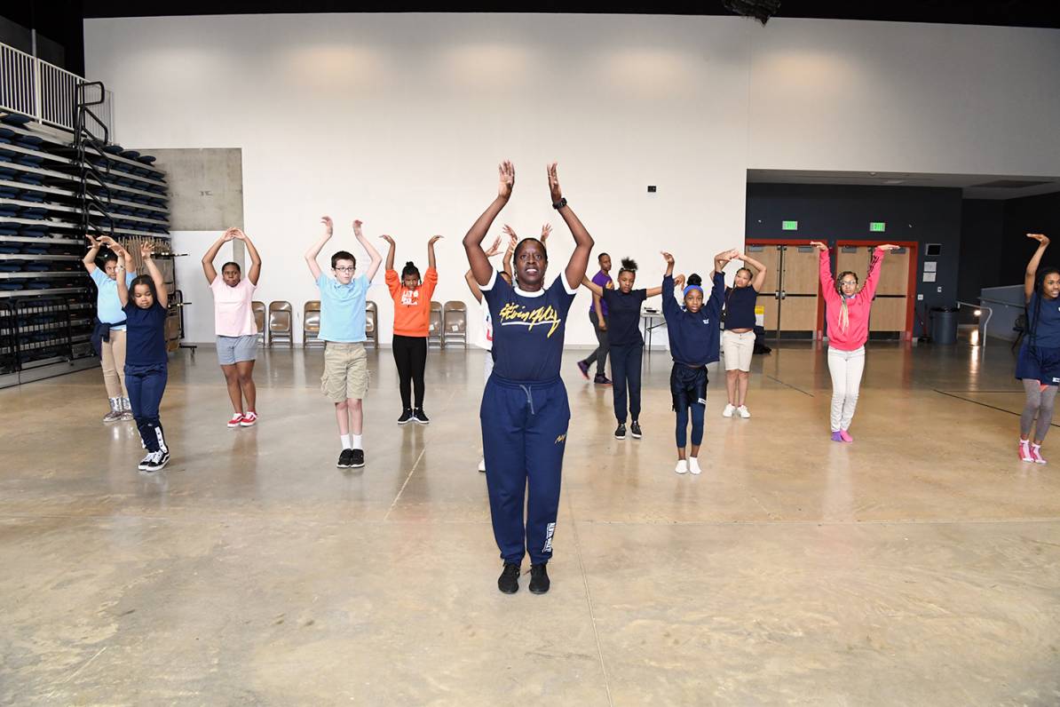 National Director of Outreach and Ailey's Arts in Education & Community Programs, Nasha Thomas, leads our Henderson Hopkins students in an opening dance exercise