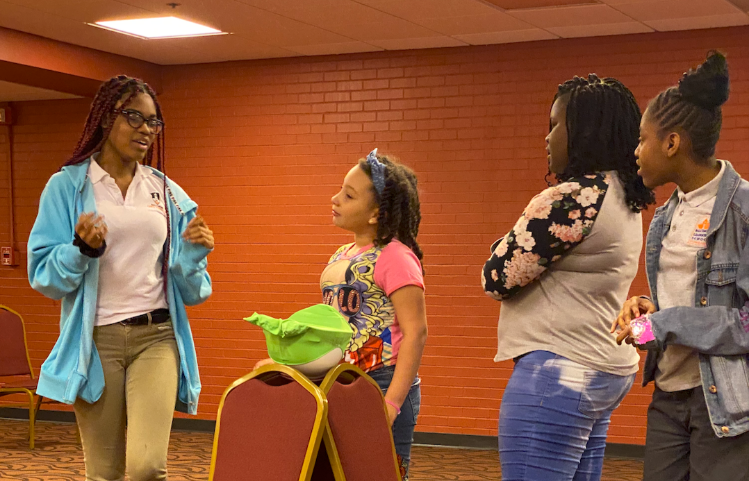 Greenmount West Community Center students during an improvisational scene with the Lyric Education team